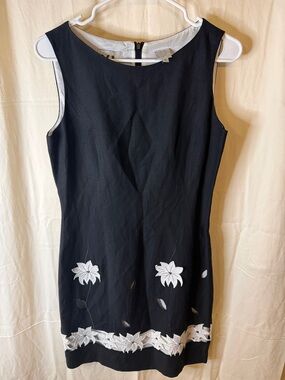 Black Sleeveless Mini Dress with White Floral Appliqué